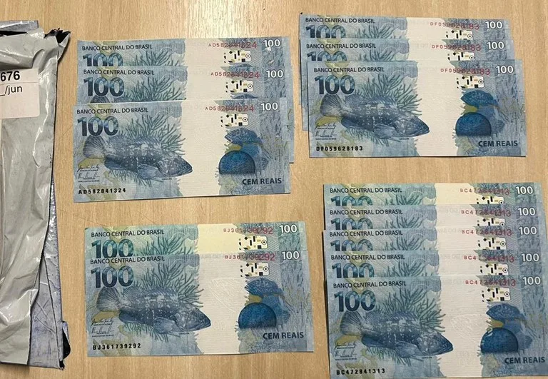 Dinheiro falso apreendido nesta sexta-feira (23). Divulgação PF Dinheiro falso apreendido nesta sexta-feira (23). Divulgação PF