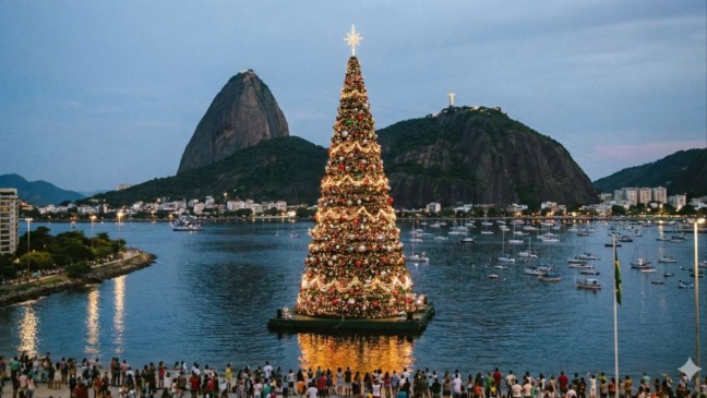 A atração gigante ao lado de Niterói ilumina a noite carioca com cores vibrantes