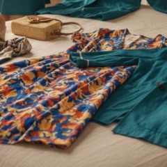 Aprenda a combinar vestidos e casacos leves sem erro