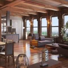 Vista do loft moderno no Rio de Janeiro mostrando cozinha, sala e área de estar integradas