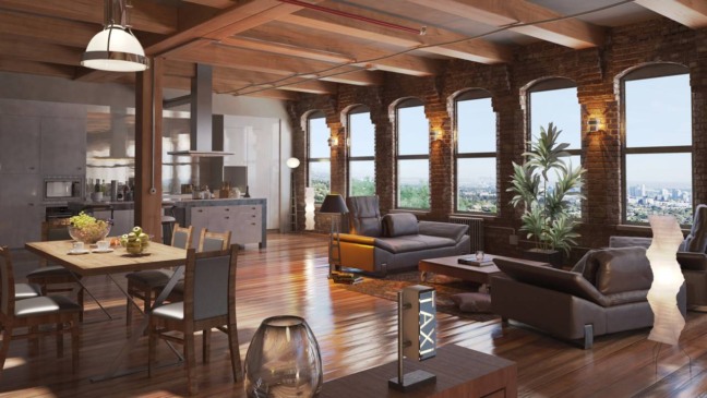 Vista do loft moderno no Rio de Janeiro mostrando cozinha, sala e área de estar integradas